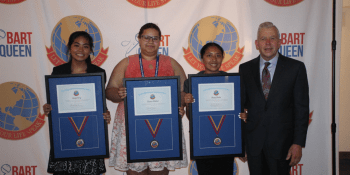 Left to right: First Place Winner Angel Uy, Lee Early College; Second Place Winner Tiana Miller, Craven Early College; Third Place Winner Suzy Brito, Lee Early College; and Bart Queen, Let Your Life Speak Founder. Photo by Lillian Mangum Photography.