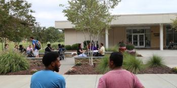 Craven CC students enjoy the fall weather outside the Student Center on the New Bern campus. New and returning students can register for B-Term through Oct. 15.