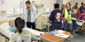 Craven CC nursing students participate in an emergency simulation to prepare for situations they will encounter on the job. The college will utilize a $150,000 grant from CarolinaEast Medical Center to hire a full-time nursing instructor in an effort to increase the quantity of highly trained nurses in the region.