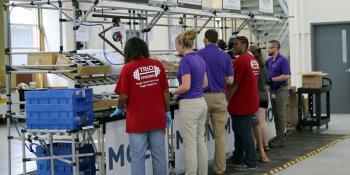 Craven CC students in the Manufacturing Career Pathway program at the Volt Center receive hands-on training on a mock assembly line recently donated by Moen. The first Manufacturing Career Pathway program at the Volt Center yielded job offers for all seven students.