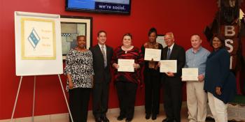 Kappa Beta Delta advisor and inductees