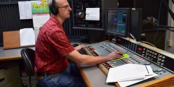 George Olsen, longtime host and producer for Public Radio East, sits behind the microphone one last time before retirement.