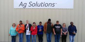 Transitions Academy students lined up outside Nutrien facility