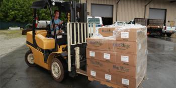 Craven Community College Safety Coordinator Taylor Heath uses a forklift to demonstrate safe practices for moving loaded pallets in an industrial setting. Forklift operation is one of several entry-level skills that will be taught in the Manufacturing Career Pathway program that begins June 18. 