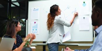 Woman giving business presentation