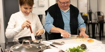 Two women cooking