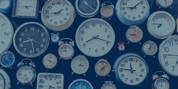 Various shapes, colors, and sizes of analog clocks